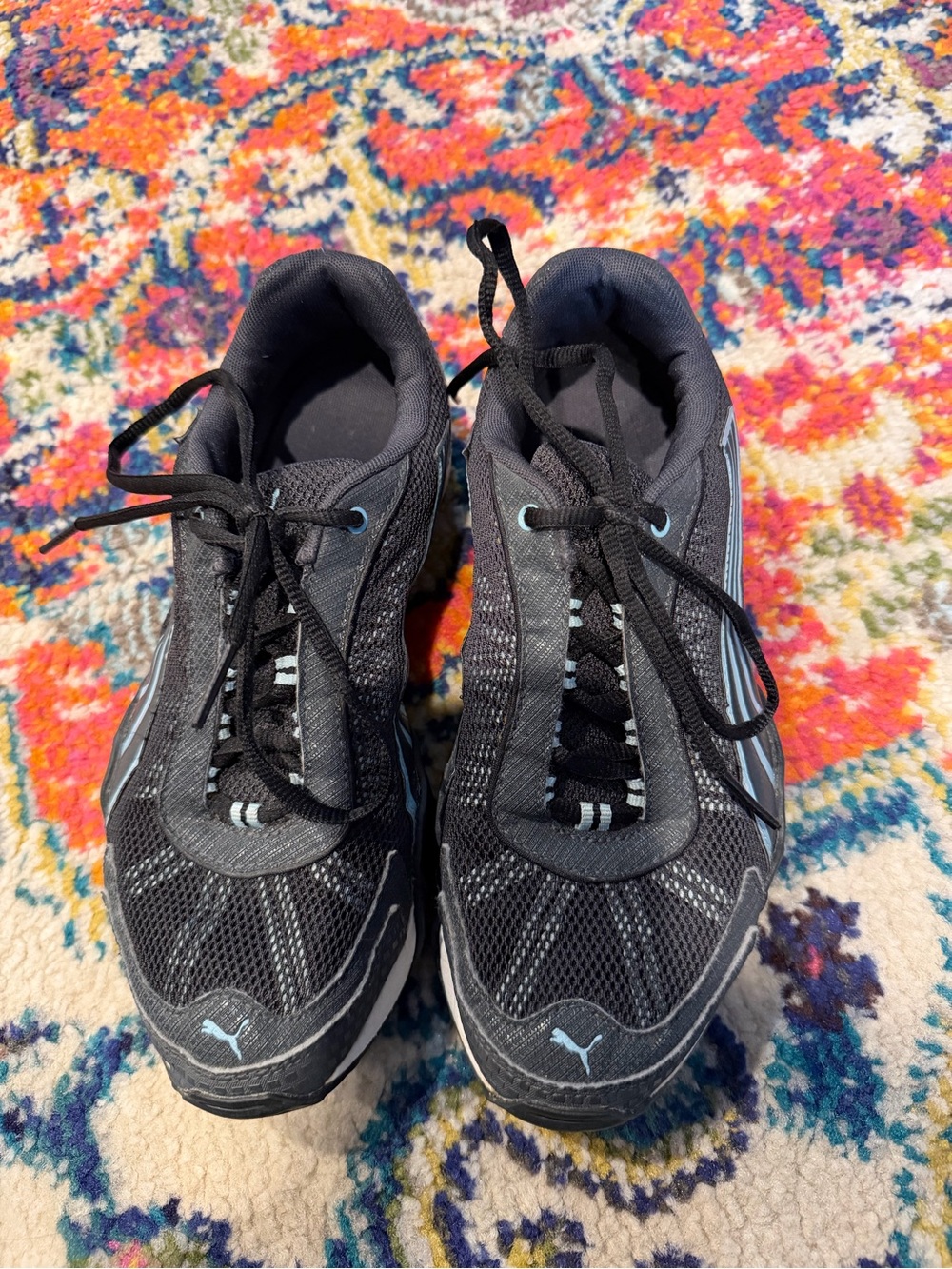 Puma Women’s Black Athletic Sneakers with Light Blue Accents